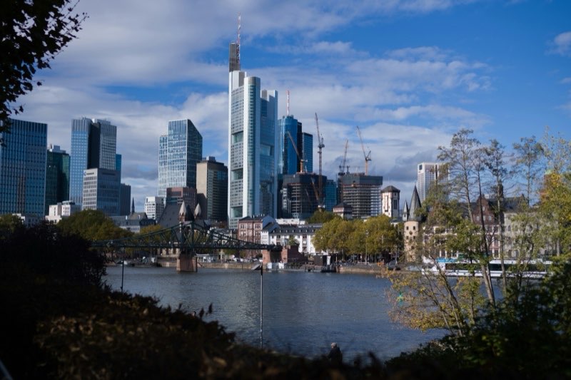 Business district skyline by the river
