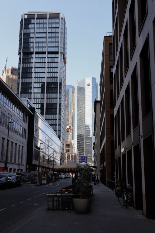 Bank towers seen down a narrow city street